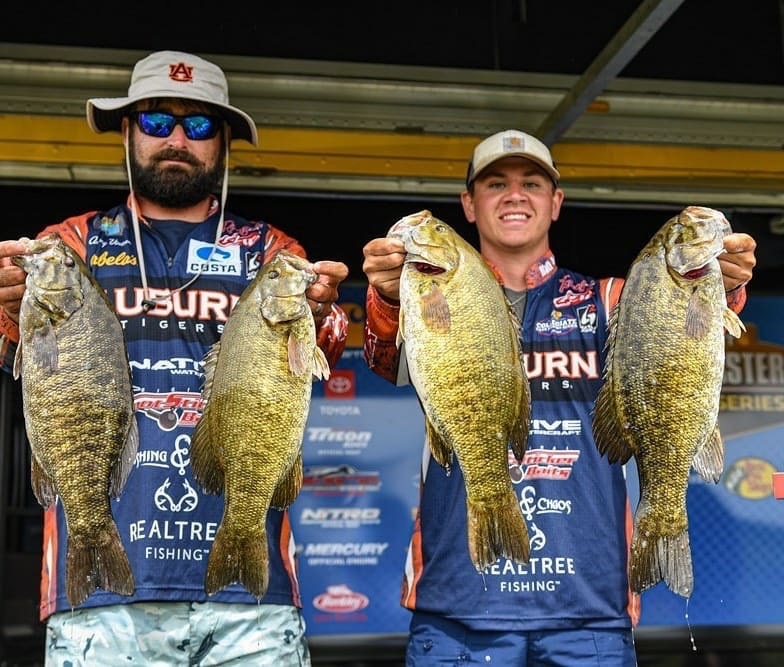 Accounting Students holding up their catches