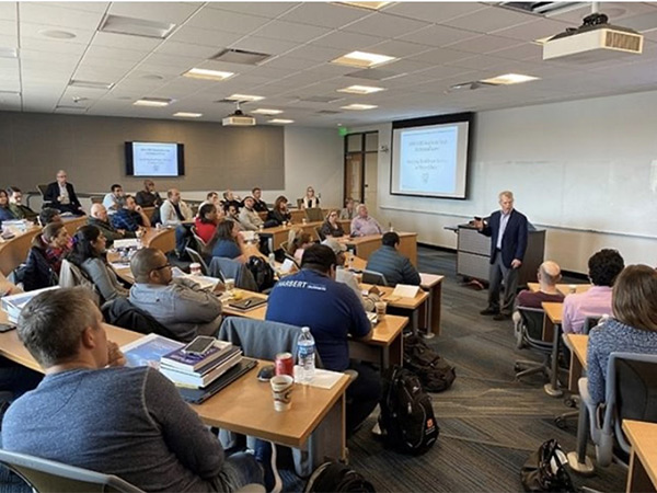 Len Berry presenting to PEMBA students