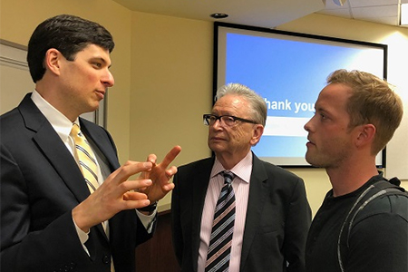 Nash and O.C. Ferrell speak with a guest.