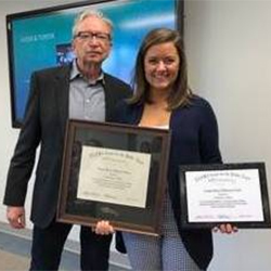O.C. Ferrell honors Catherine Miller with her award.