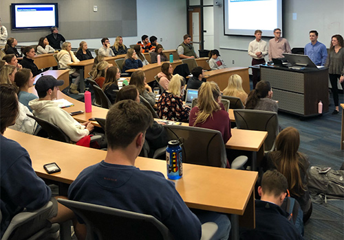 Students debate to crowd