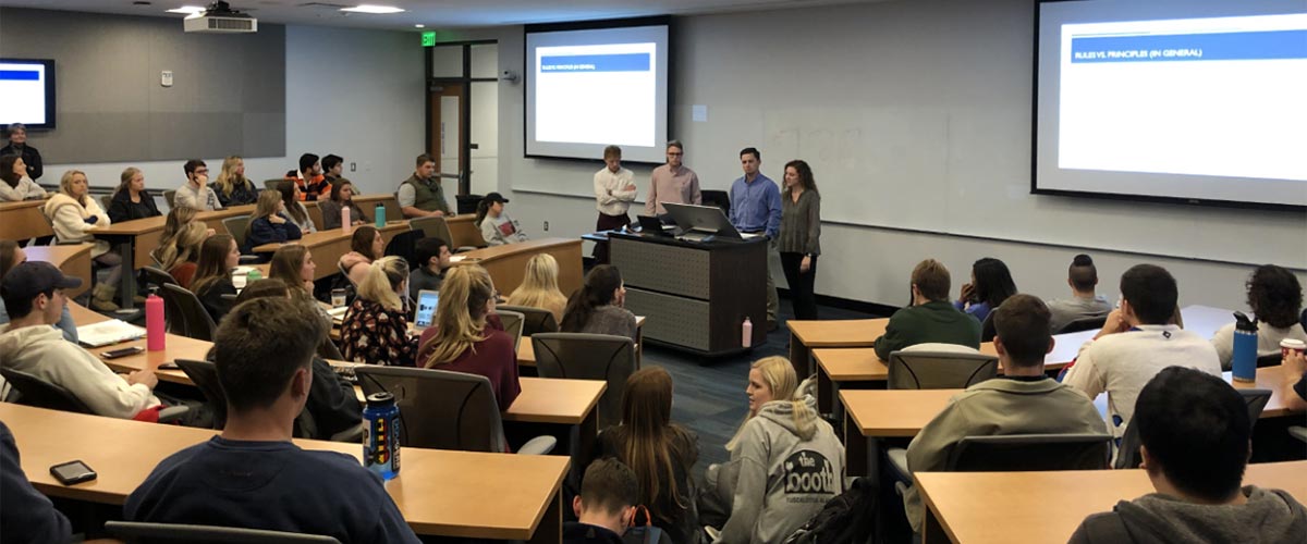 Students debate to crowd