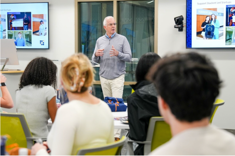 Man teaching in front of class
