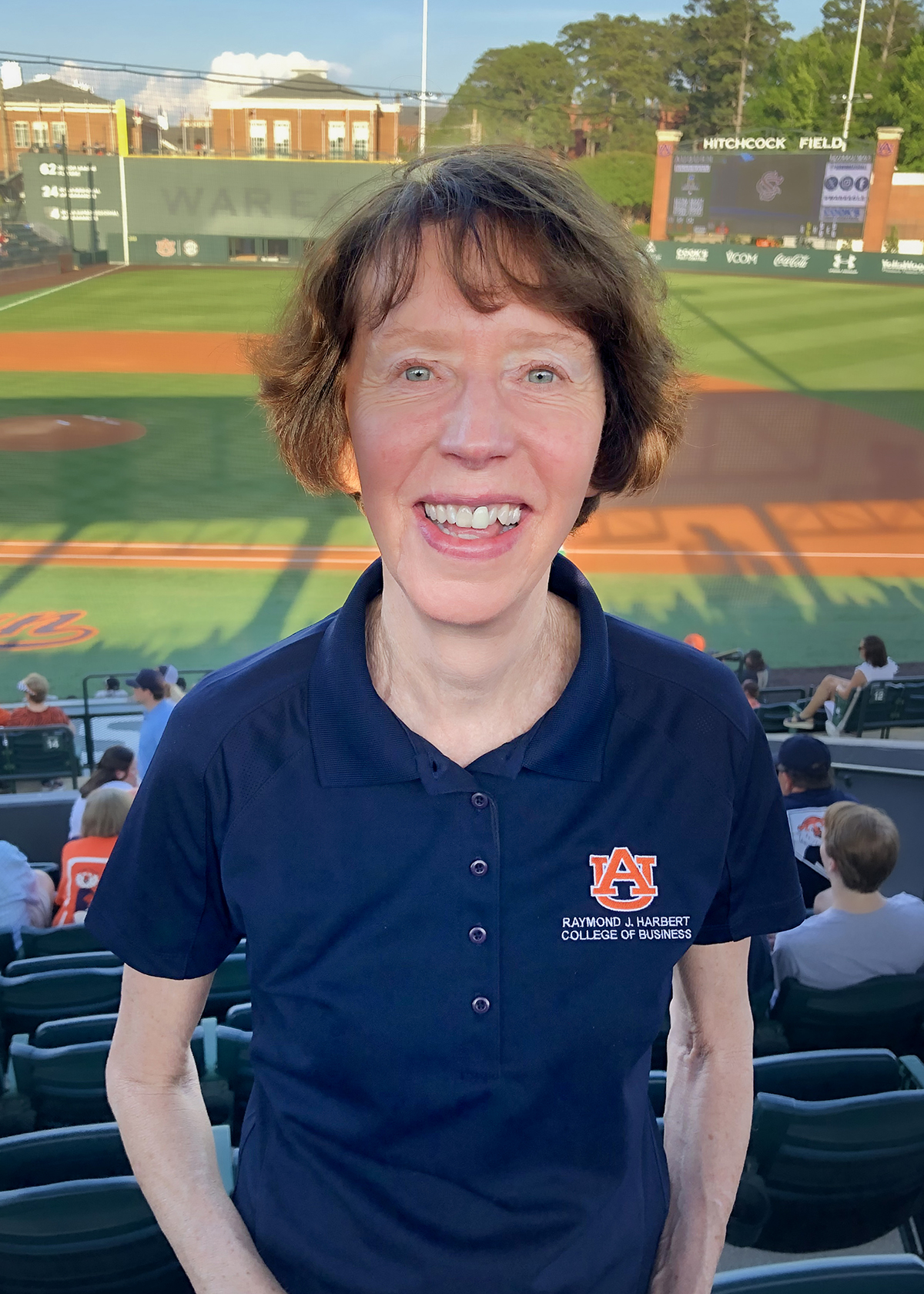 Kim Key in stands at baseball game