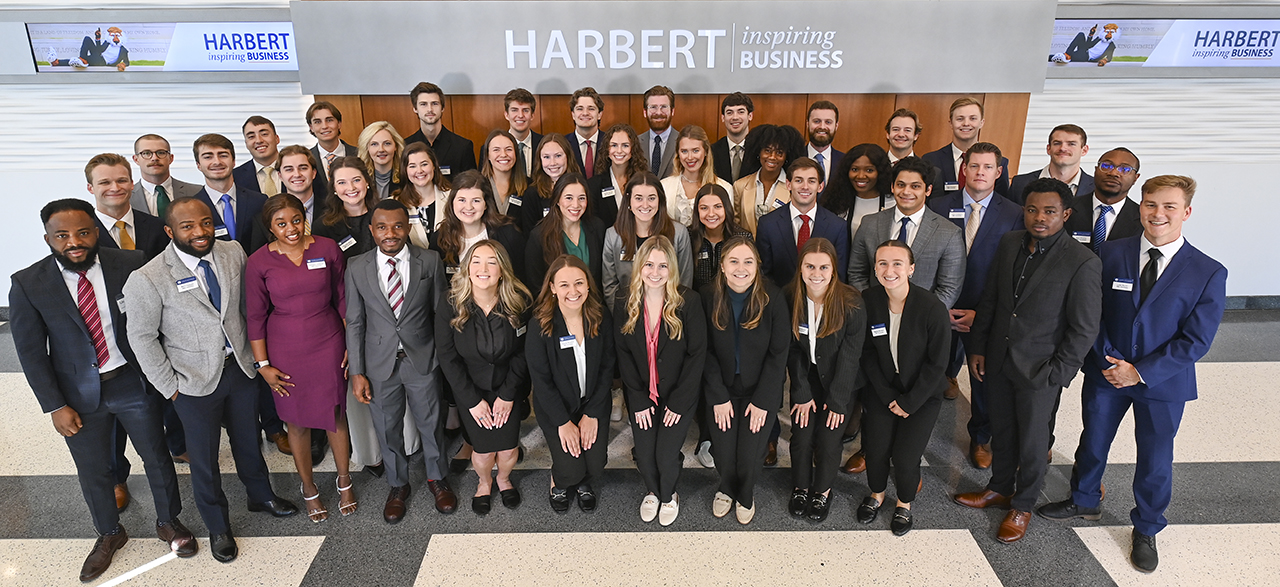 Group of MBA students standing for photo