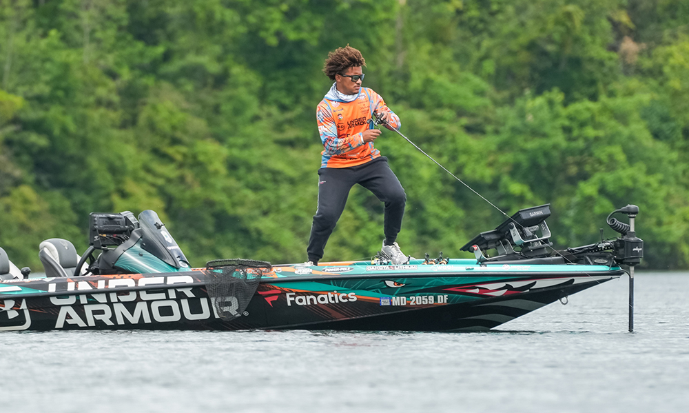 Man fishing off a boat