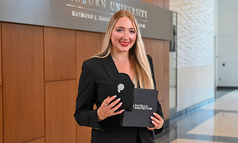 Woman holding patella protector product
