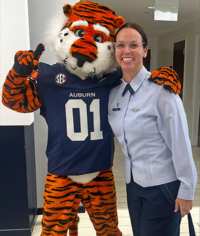Woman standing with Aubie