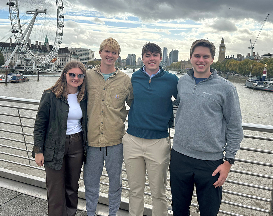 Four students on London Bridge