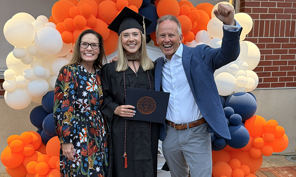 3 people at graduation