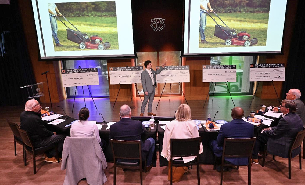 Student presenting at pitch competition