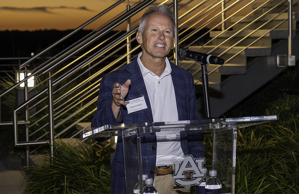 Man speaking at podium