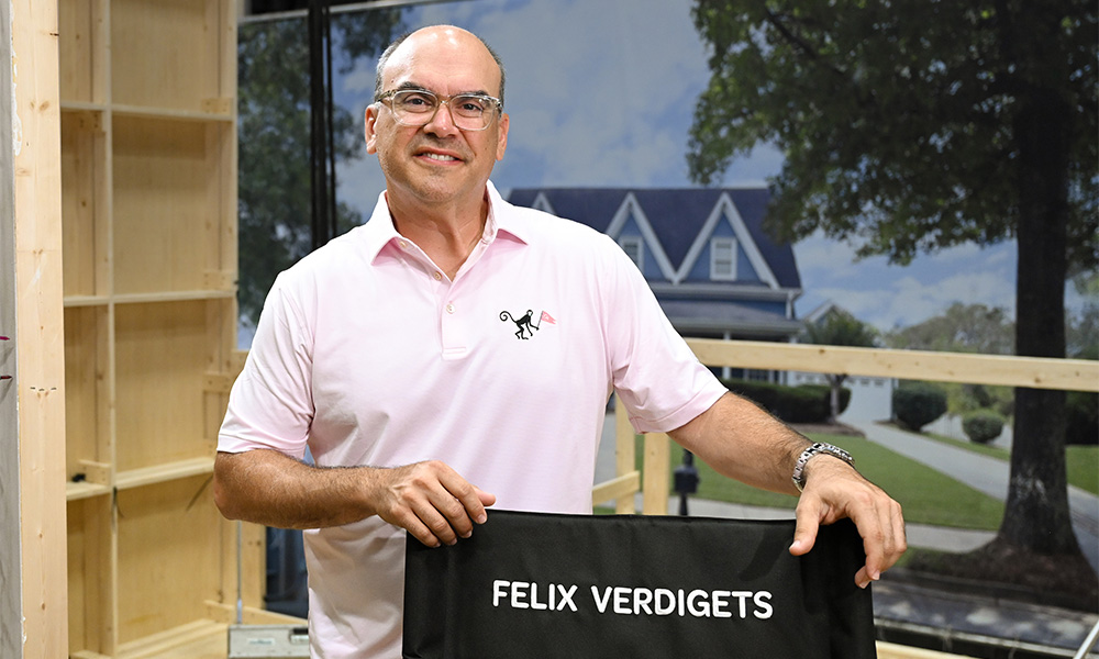 Man standing by chair