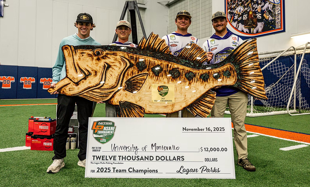 Men holding prize check