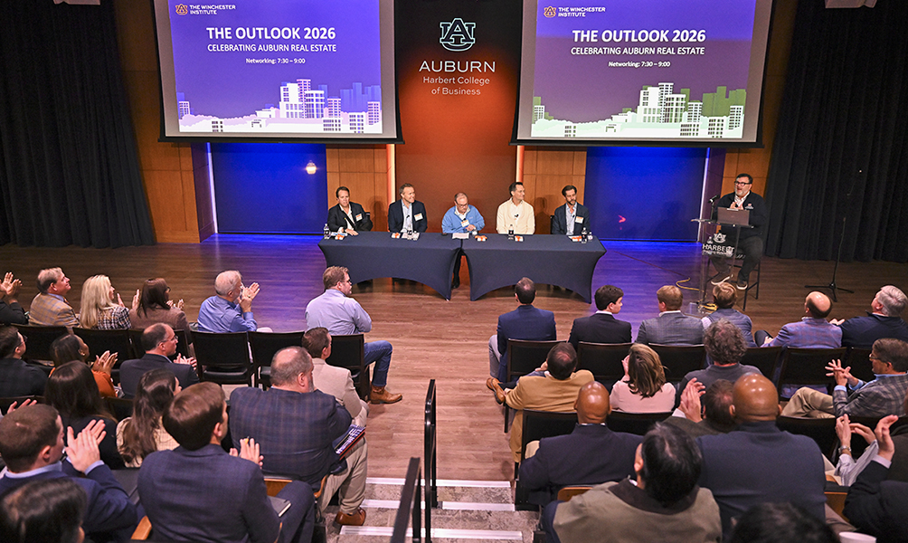 panelists speaking to audience