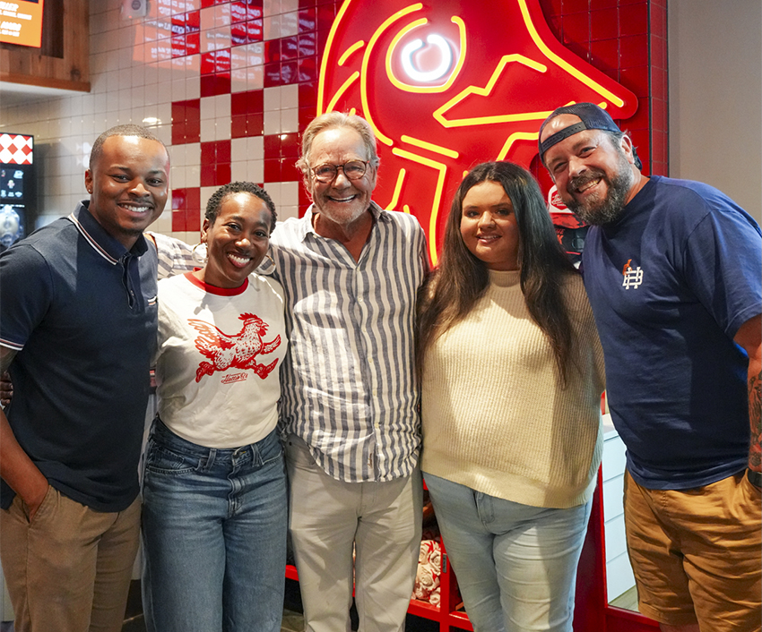 Harbert marketing and Hatti Bi's Five people standing together