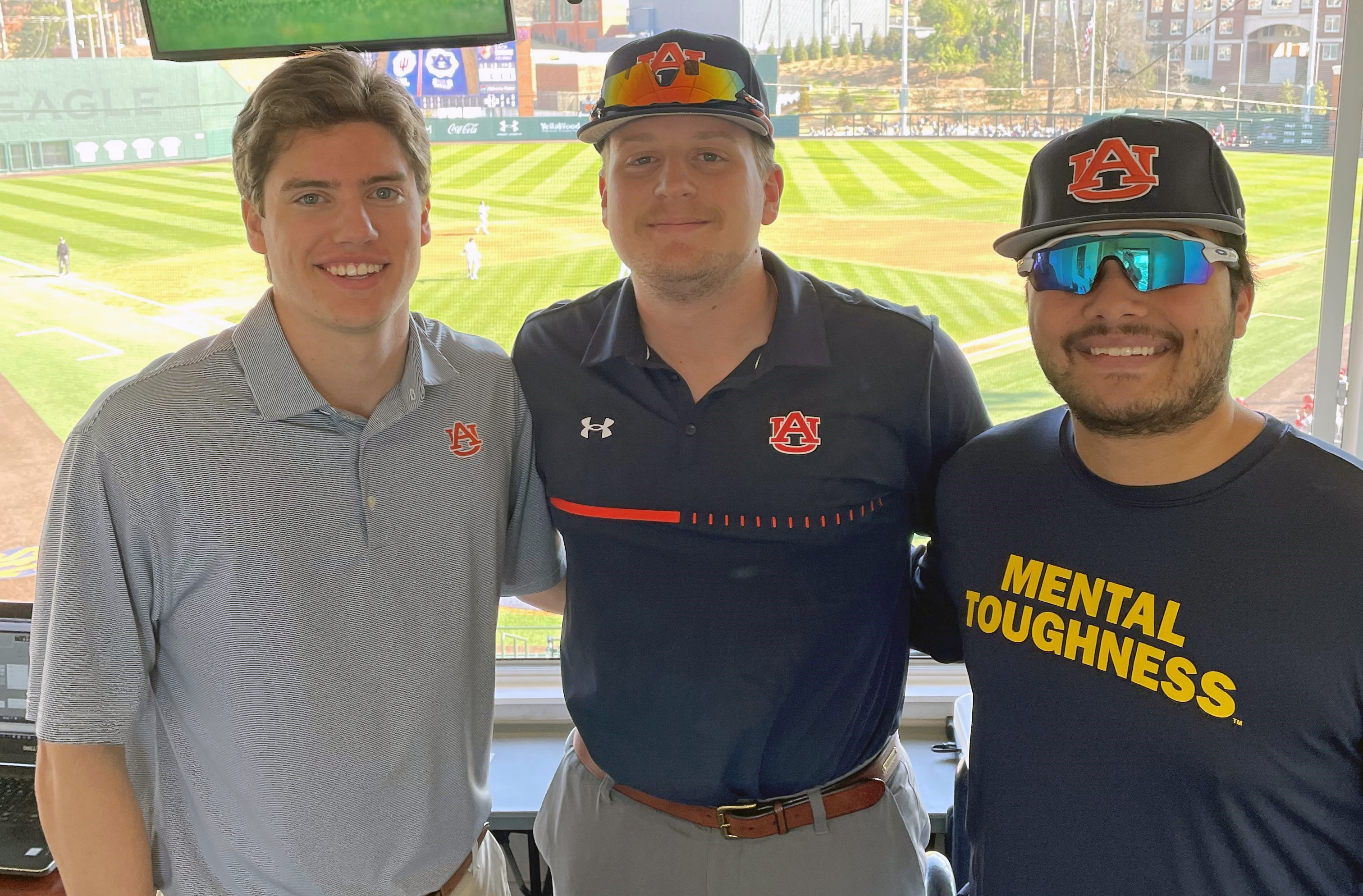 Boston Smith and co-workers in press box