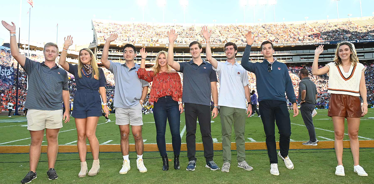 FMA-leaders-wave-on-field