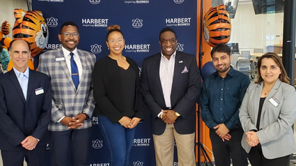 Auburn alumnus Mike Mosquito (third from right), a director with RSM, is pictured with Harbert College of Business leaders and faculty (left to right) Joe Hanna, Edward Reynolds, Renee Pratt, Pankush Kalgotra and Uzma Raja. 