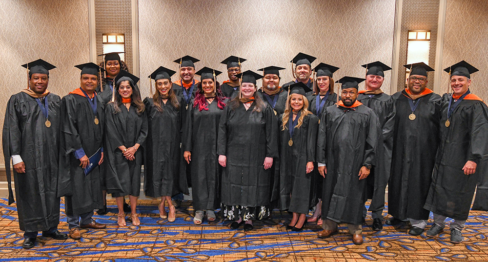 PEMBA class of 2021 in cap and gowns