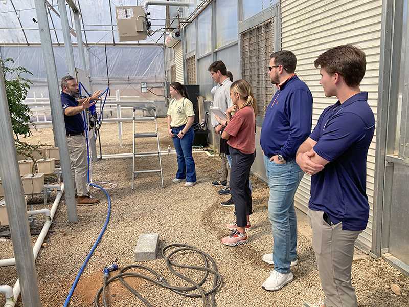 Daniel Wells explains food growth on campus