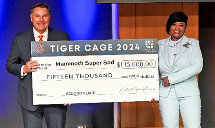 Tiger Cage C Howard holding 2nd pl check