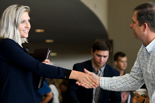 Handshake between student and a recruiter